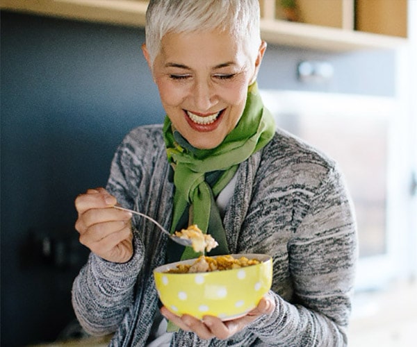 Woman eating cereal